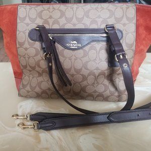 Signature Coach shoulder or crossbody bag